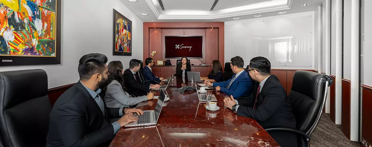 Clients having a meeting in Servcorp’s Meeting Rooms in Emirates Towers, Dubai that offer world-class facilities